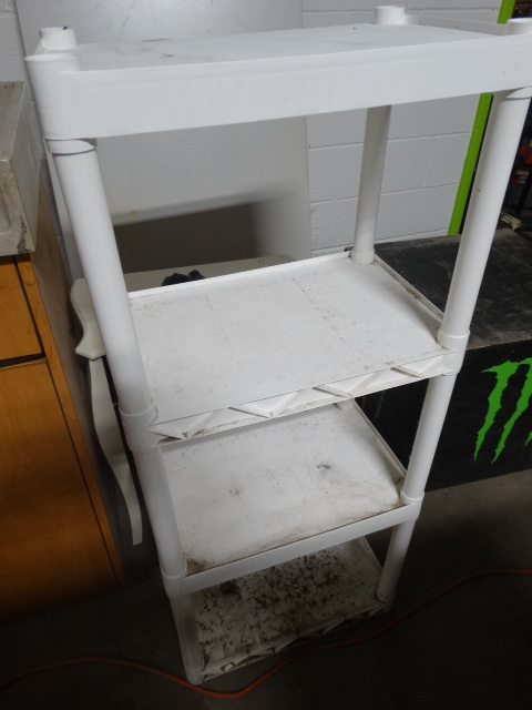 lot 6276 image: Plastic shelf w4 shelves.