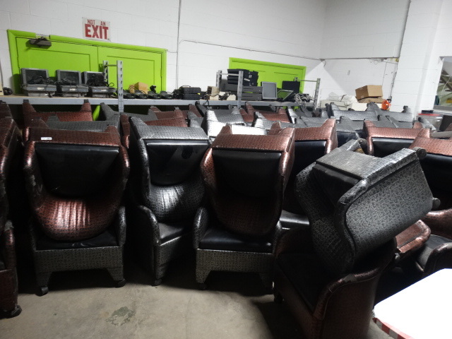 lot 6279 image: Approximatley 71 cushined chairs on wheels.