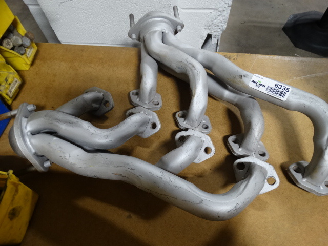 lot 6335 image: Car headers.