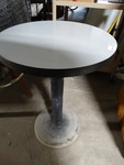 Small pedestal table.
