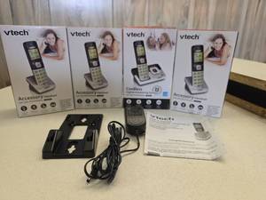 lot 229 image: VTech CS6709 Cordless Phone System with Extra Handsets