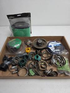 lot 338 image: Lawn Equipment Parts Lot with Air Filter and Trimmer Line