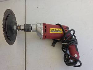 lot 365 image: Chicago Electric 12 Variable Speed Hammer Drill with Attachment