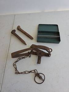 lot 397 image: Pocket Tackle Box with Railroad Spikes and Animal Trap