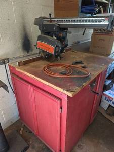 lot 539 image: Sears Craftsman 10-inch Radial Arm Saw with Storage Cabinet (Powers on)
