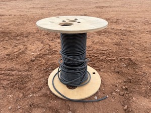 lot 3155 image: Roll of Security Wire - Fiber Optic Wire on Wooden Spool