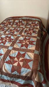 lot 1003 image: Handmade Quilt - 94 x 116Some tears.  Mostly on backing