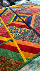 lot 1014 image: Handmade Quilt  - 34 x 34
