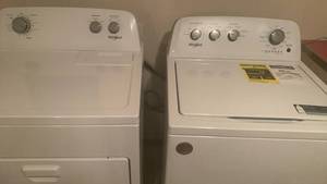 lot 1043 image: Whirlpool Top Load Washer and Dryer Set 45 x 29 x 26 in