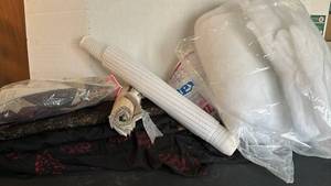 lot 1213 image: Bolts of cloth, Fiberfill and more