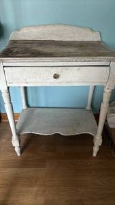 lot 1215 image: Small wooden Table 32 with niches tall, 26 inches wide and 17 inches deep