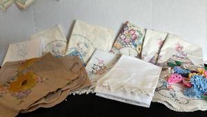 lot 1224 image: Apron, pillowcases, doilies and table toppers - crocheted and embroidered