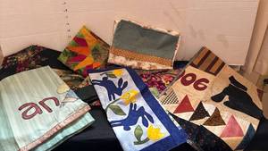 lot 1305 image: Handmade Easter pillowcase, placemats, napkin, unfinished pieces and more