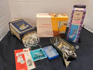 lot 1413 image: Buttonholer, coverstitch binder assorted sewing machine feet and misc.