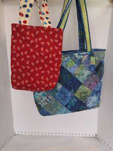 lot 1556 image: Quilted totes