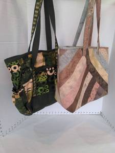 lot 1557 image: Two Large quilted totes