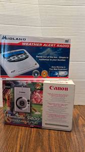 lot 1811 image: Cannon Power Shot and Weather Alert Radio
