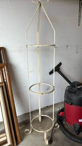 lot 2004 image: Metal Plant stand 4 feet tall