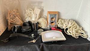 lot 2107 image: Clothespins and line, lock and key, casters and more