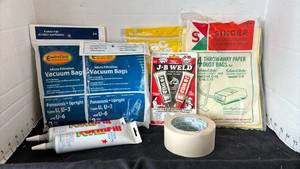 lot 2118 image: Vacuum bags, caulk, tape and more
