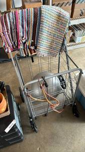 lot 2205 image: Metal cart on wheels, rugs and bungees