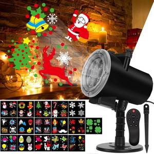 lot 26750 image: Holiday Projector Lights Outdoor, 10W LED Christmas Projector Lights with 16pc Slides Patterns IP65 Waterproof for Christmas Decorations Birthday Party Indoor Outdoor Lighting Projectors - Retail $8