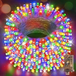 lot 32880 image: Hezbjiti Christmas String Lights Outdoor, 1000 LED 394ft 8 Lighting Modes Christmas Fairy Lights with Remote and Timer for Home, Birthday, Wedding, Party, Tree Decorations (1000 LED, Multicolor) - Retail $28