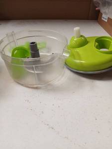 lot 51446 image: Manual Food Chopper with Clear Bowl CHIP ON BOTTOM - Retail $15