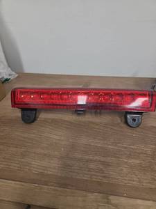 lot 16182 image: Chevrolet Tahoe 3rd Brake Light - Retail $0