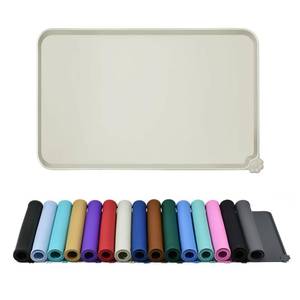 lot 62118 image: Waterproof Pet Feeding Mat with High Raised Edges, Heavier and Thicker Placemats for Cat Dog Water Bowl with BPA Free, Dogs Cats Food Mats for Messy Drinkers to Prevent Spill and Protect Floors - Retail $14
