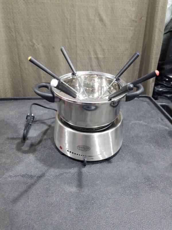 lot 3431 image: Nostalgia Stainless Steel Electric Fondue Pot Set
