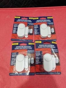 lot 4063 image: (4) WINDOW AND DOOR ALARM PIERCING SOUND EASY TO INSTALL BATTERIES INCLUDED