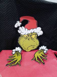 lot 4085 image: The Grinch Christmas Santa Fence Sitter Decor