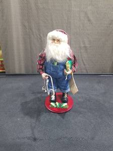 lot 4151 image: Fishing Santa Claus Figurine