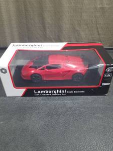 lot 4178 image: Lamborghini Sesto Elemento 124 Licensed Friction Car Red by Braha Ages 3 NEW