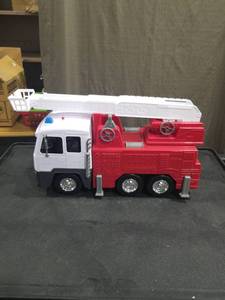 lot 4190 image: Large Red and White Fire Truck Toy with Extending Ladder