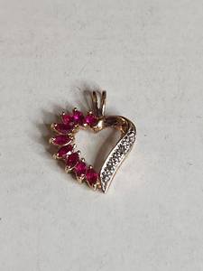 lot 1011 image: Ross Simons Sterling Silver Gold Plated Diamond And Ruby Pendant