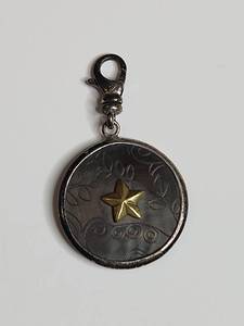 lot 1033 image: Silpada .925 Mother of Pearl Star Charm