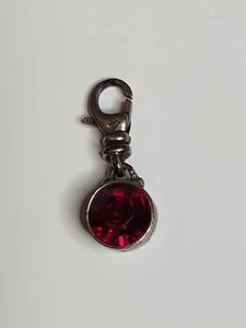 lot 1035 image: Silpada .925 Sterling Silver Ruby Crystal Charm