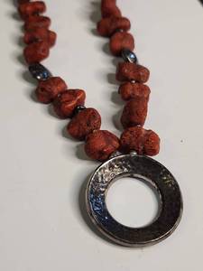 lot 1101 image: Silpada .925 Coral and Silver Circle Pendant Necklace Retired
