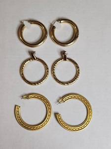 lot 1235 image: Three Pairs of Gold Tone Hoop Earrings Set