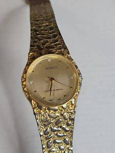 lot 1415 image: Geneva Gold Nugget Pattern Watch