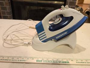 lot 109 image: Oreck Steam Iron White and Navy Blue