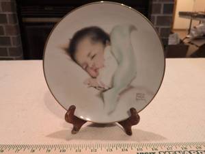 lot 136 image: A Little Bit of Heaven Collector Plate by Bessie Pease Gutmann