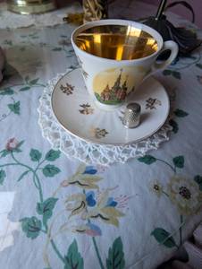 lot 681 image: Castle Motif Tea Cup and Saucer Set