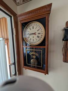 lot 692 image: Standard Time Wall Clock with Carved Wood Frame