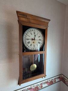 lot 702 image: Calendar Wall Clock with Oak Case