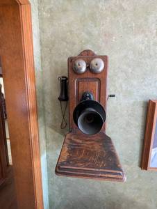 lot 705 image: 1920s Western Electric Oak Wall Telephone