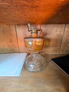 lot 714 image: Clear Glass Oil Lamp with Brass Burner