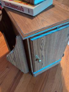 lot 3105 image: Side tablecabinet with magazine rack and pull out table. 1908 Sears Roebuck & Co. Garden Encyclopedia Book included.